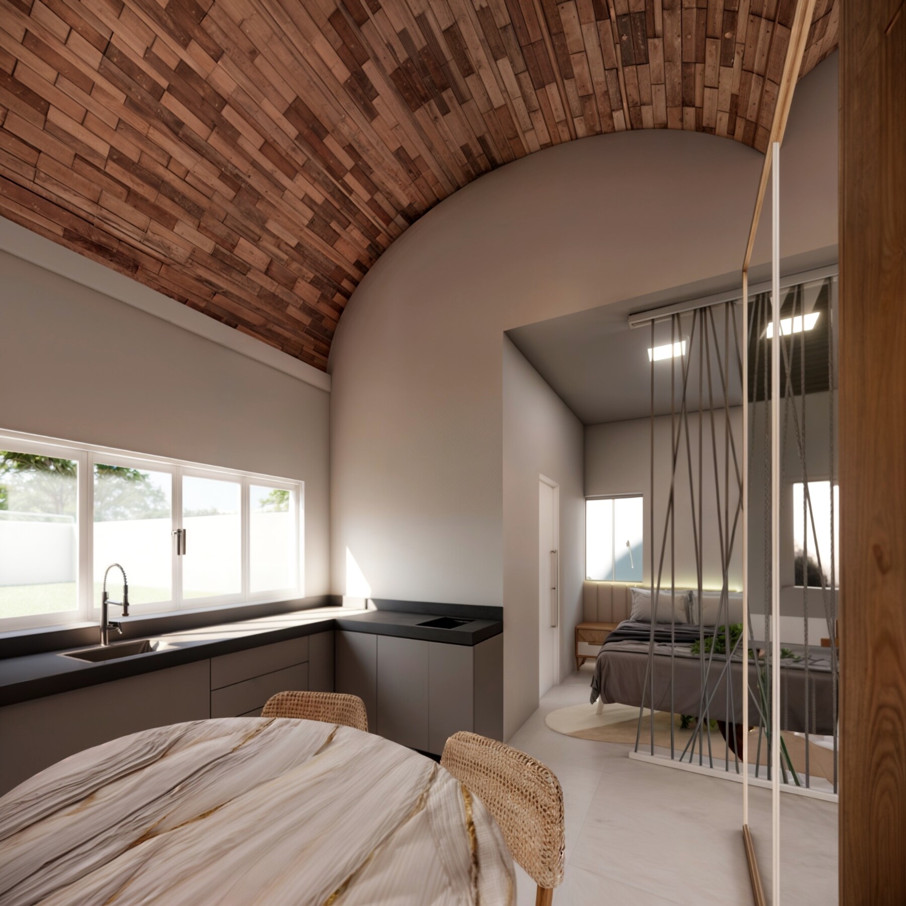 Interior do KitZnet — teto abobadado em madeira, cozinha e área integrada